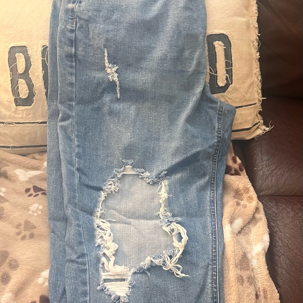 Women’s jeans ; naturally ripped, size 14 ( a little wide)